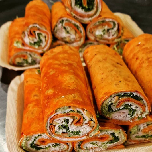 Wrap kip-pesto met burrata en pijnboompit en slamelange