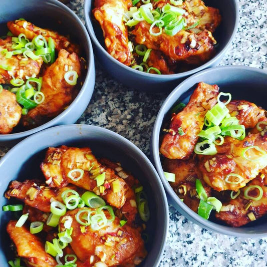 Kipkluiven in marinade van o.a. soja en honing